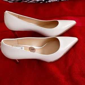Coach pumps...brand new, never worn